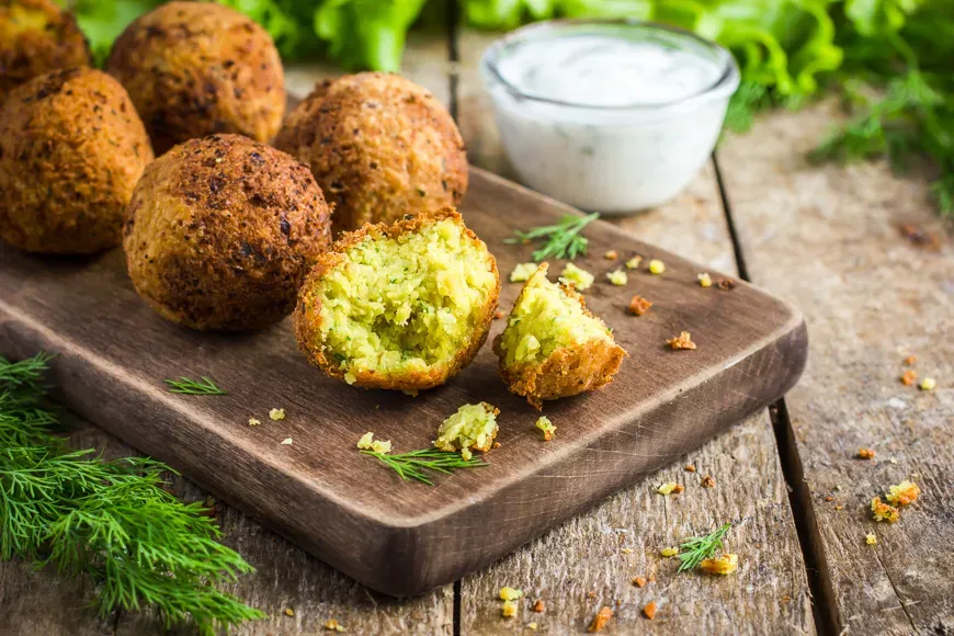 fresh vegetarian falafel with tzatziki sauce, selective focus  